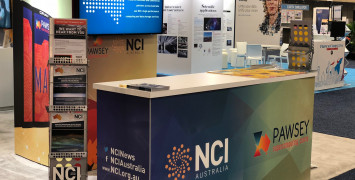 The front counter of the NCI and Pawsey booth at the SC18 conference.