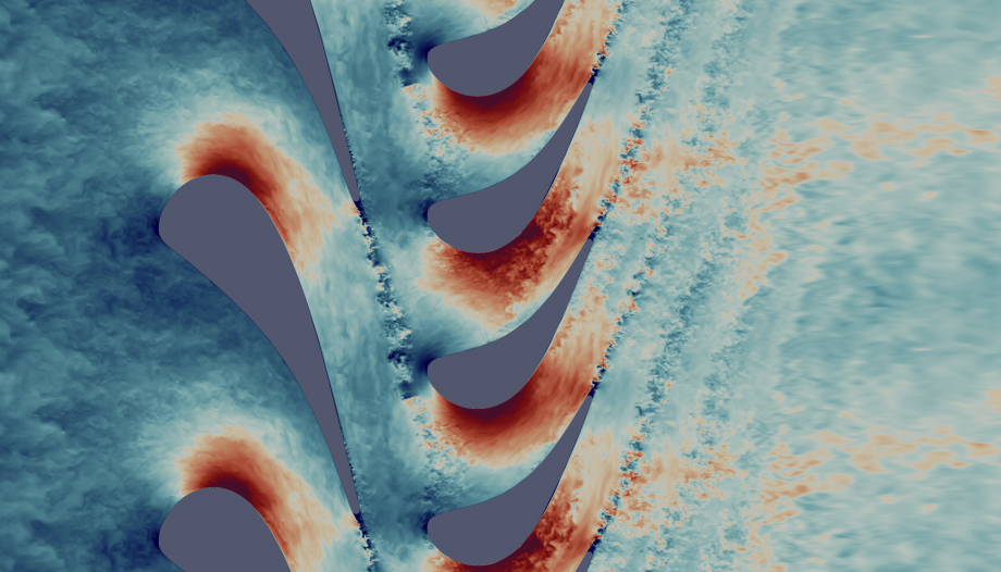 A view of turbulent air flows inside a gas turbine using Direct Numerical Simulation. Air in shades of blue (for slow) and red (for fast) swirl off from the tip of turbine blades.