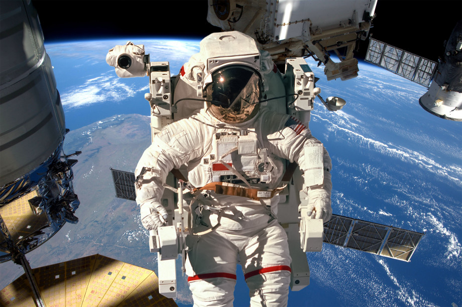 Astronaut in space with Earth in background 