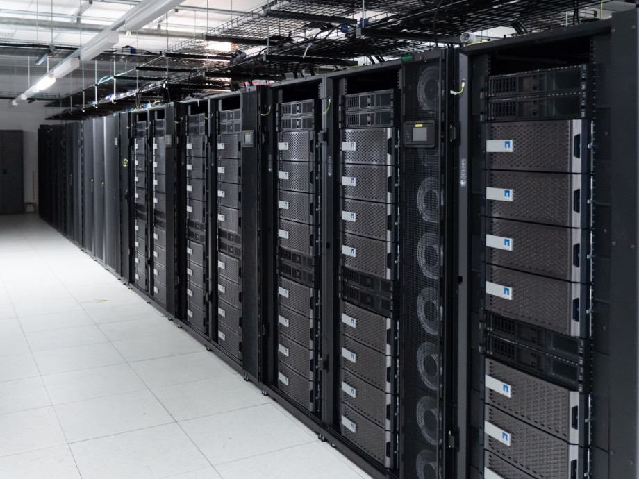 A row of computer equipment in a data centre.