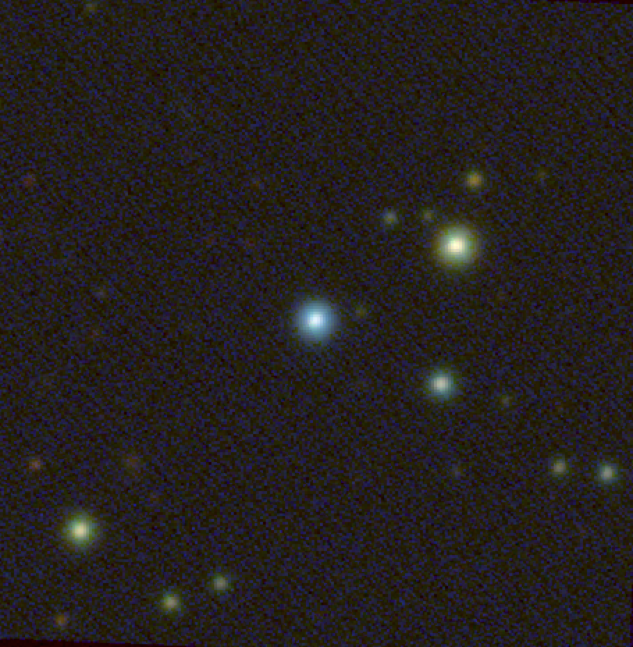 A blurry image of stars and dots of light, the actual image taken by the SkyMapper telescope.