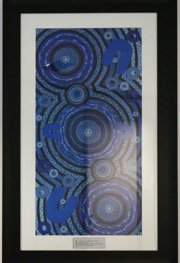 An intricate blue and purple painting showing dots and rings framed with a white border and black frame.