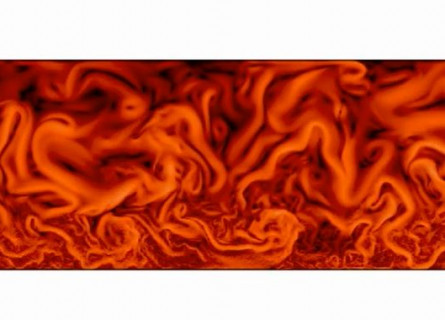 A still from an ocean water mixing model showing irregular swirls of orange and red.