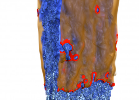 Volume rendering of chemical reaction rate (orange-red) and vorticity magnitude (blue-white).