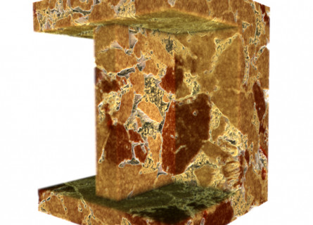 Three-dimensional view inside a cube of rock showing pores and multiple materials.
