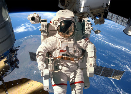 Astronaut in space with Earth in the background
