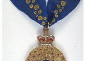 The gold medal with blue ribbon given to Companions of the Order of Australia.